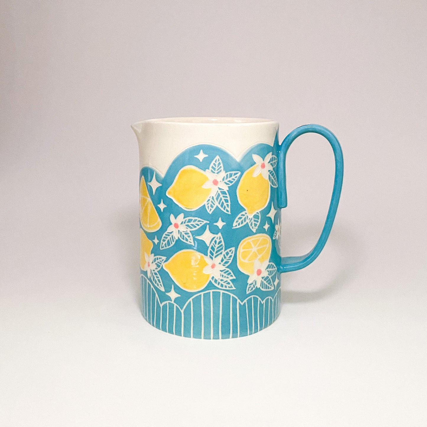Blue Pitcher with Lemon